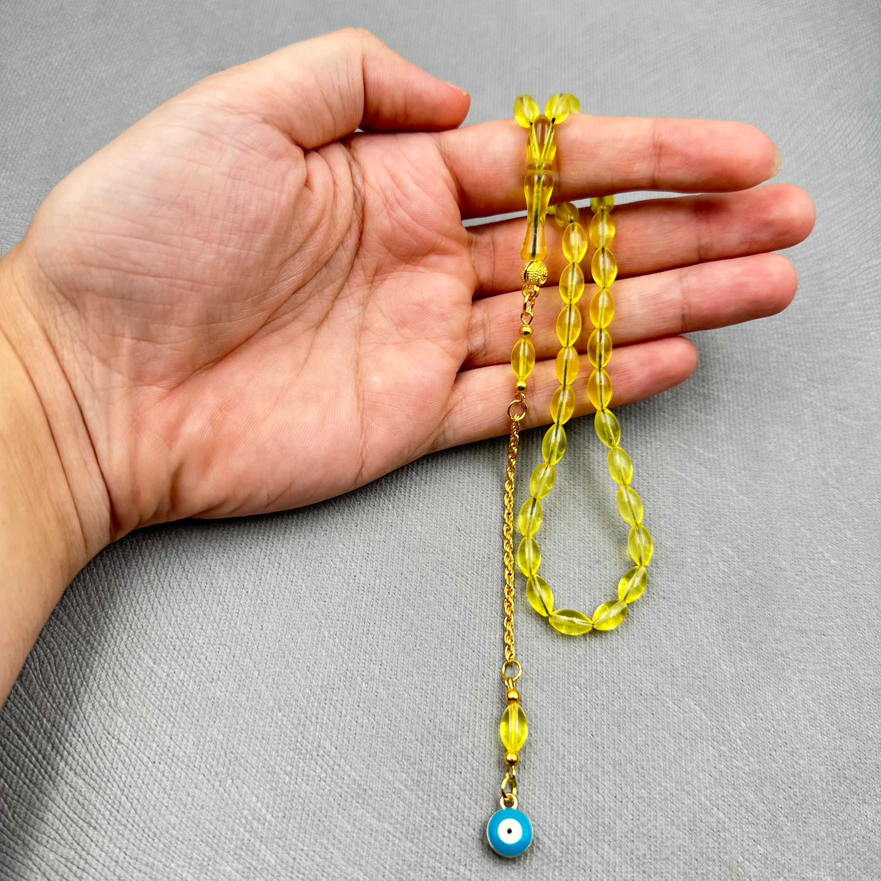 Pirinç Püsküllü Nazar Boncuğu Detaylı Bilek Boy Sarı Uçak Camı Tespih